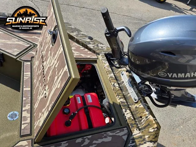 Slide: The Image of 2025 Avid 16 Commander boat with Yamaha motor and camo design at Sunrise Marine & Motorsports. - 5