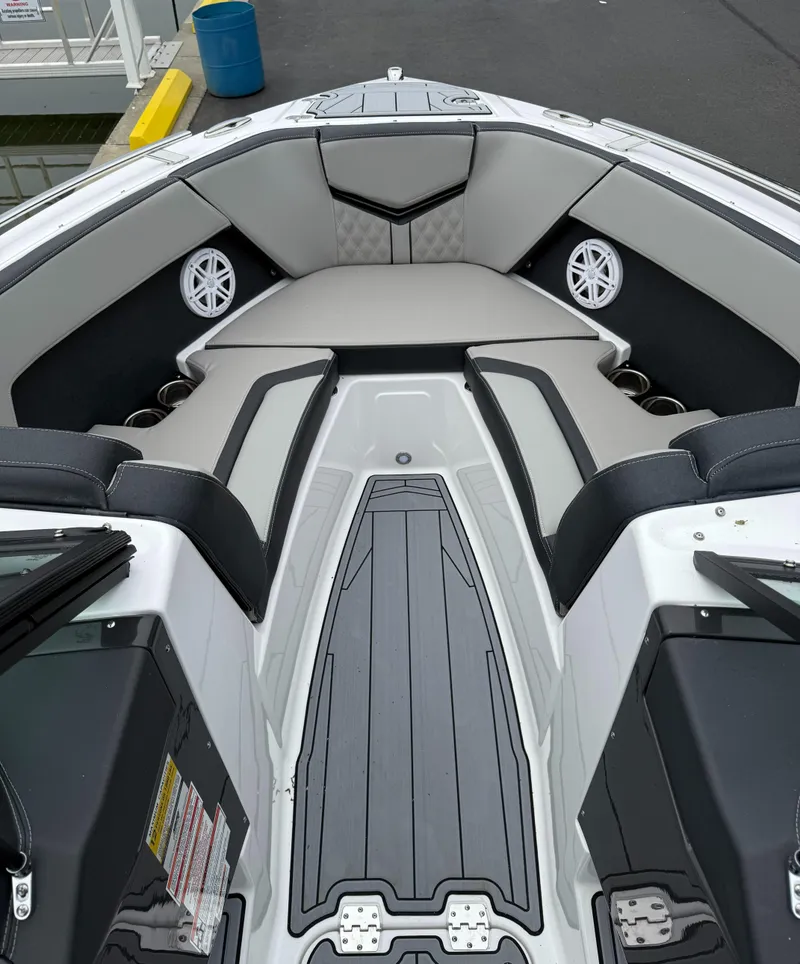 Slide: The Image of 2025 Monterey 235 Super Sport boat interior with sleek seating and modern design. - 10