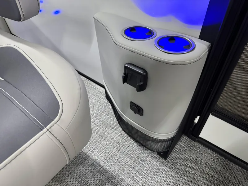 Slide: The Image of 2025 Barletta Corsa 23UC interior with illuminated cup holders and modern seating. - 19