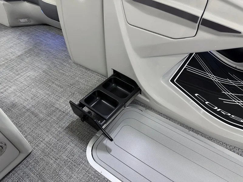 Slide: The Image of 2025 Barletta Corsa 23UC interior with retractable cup holder and modern flooring. - 26