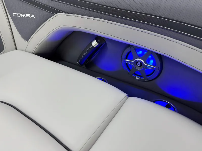 Slide: The Image of 2025 Barletta Corsa 23UC interior with illuminated speakers and sleek seating. - 29