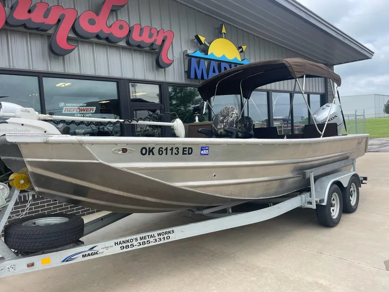 Slide: The Image of Aluminum Hanko 20-6 boat on trailer outside marine store, 2016 model. - 0