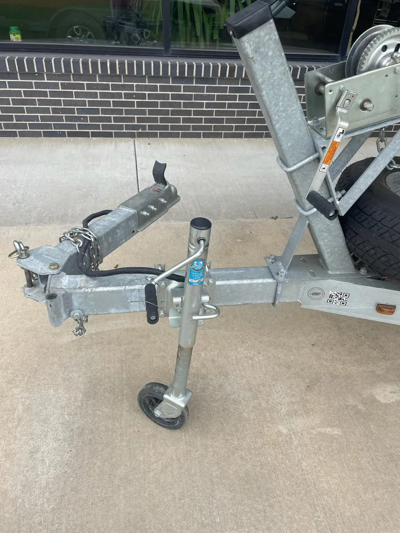 Slide: The Image of Trailer hitch and jack stand of a 2016 Hanko 20-6 on concrete pavement. - 9