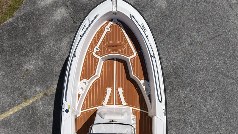 Slide: The Image of Top view of 2003 Boston Whaler 21 Outrage boat with wooden deck. - 10