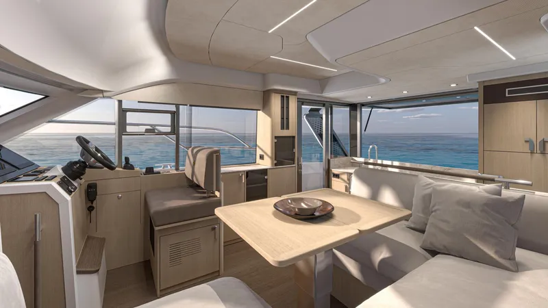 Slide: The Image of Luxurious interior of 2025 Prestige F4.3 yacht with ocean view, featuring modern seating and dining area. - 7