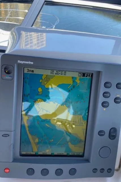 Slide: The Image of Close-up of a Raymarine navigation system on a 2003 Silverton 35 MY boat. - 14