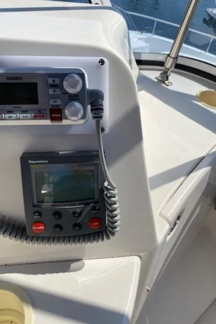 Slide: The Image of Raymarine navigation system on 2003 Silverton 35 MY boat, displaying nautical chart. - 15