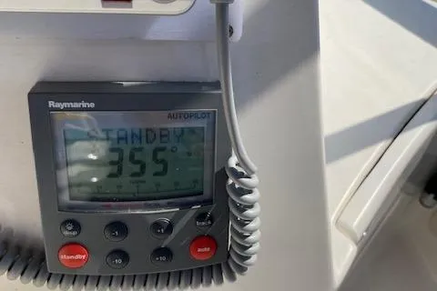 Slide: The Image of 2003 Silverton 35 MY yacht helm with navigation and communication equipment. - 16