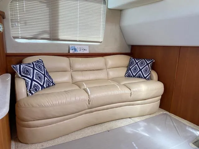 Slide: The Image of Luxurious interior of 2003 Silverton 35 MY yacht with cozy seating and modern amenities. - 22