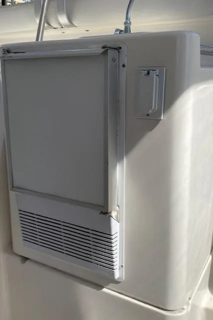 Slide: The Image of Luxurious beige leather sofa in 2003 Silverton 35 MY yacht interior, with patterned cushions. - 23