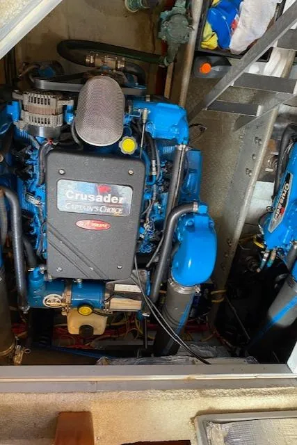 Slide: The Image of Interior of 2003 Silverton 35 MY yacht with wooden cabinetry and carpeted stairs. - 38