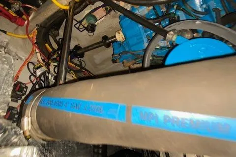 Slide: The Image of Engine room of 2003 Silverton 35 MY with batteries and wiring. - 44