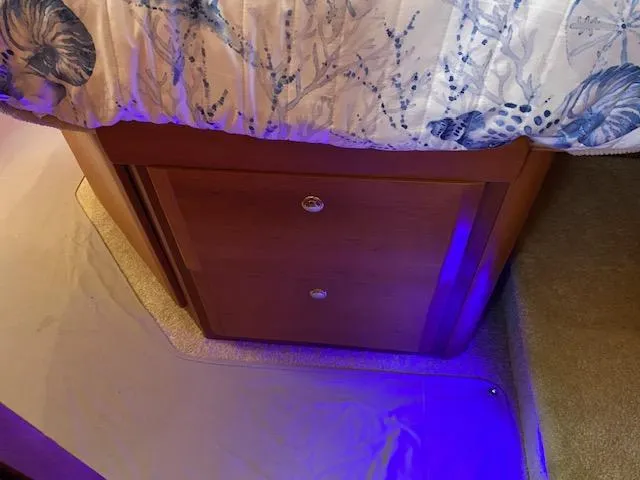 Slide: The Image of Engine room of a 2003 Silverton 35 MY boat, showing pipes and wiring. - 45