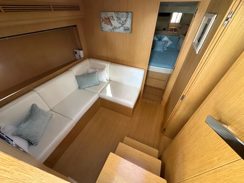 Slide: The Image of Luxurious interior of 2013 Austin Parker Open 42 yacht with cozy seating and bedroom. - 18