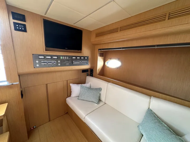 Slide: The Image of Interior of 2013 Austin Parker Open 42 yacht with modern seating and entertainment system. - 19