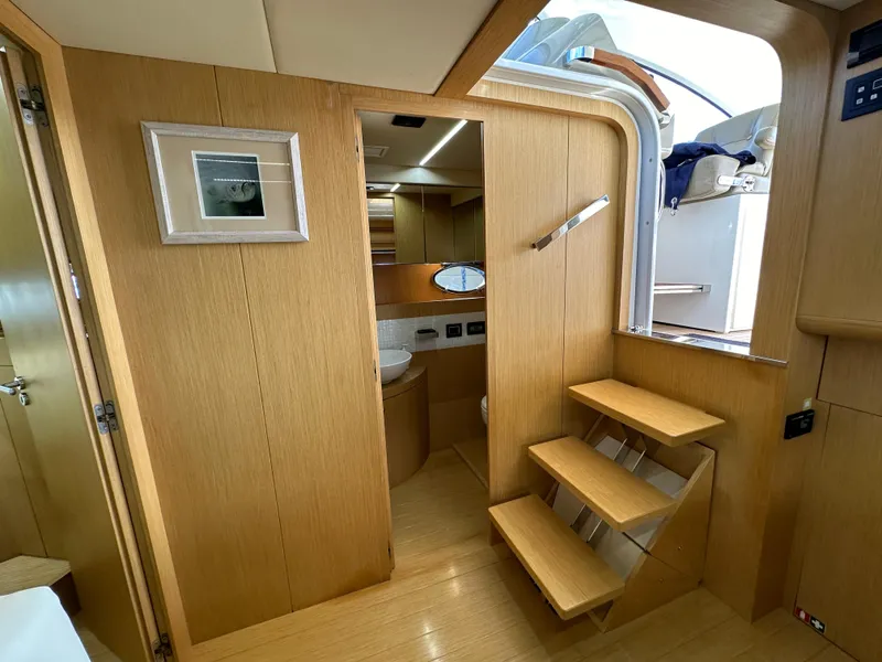 Slide: The Image of Interior of 2013 Austin Parker Open 42 yacht with wooden stairs and modern design. - 22