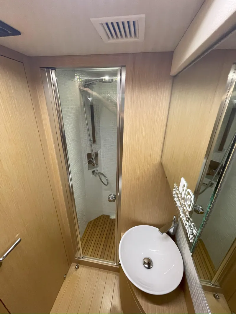 Slide: The Image of Bathroom interior of 2013 Austin Parker Open 42 yacht with shower and sink. - 25