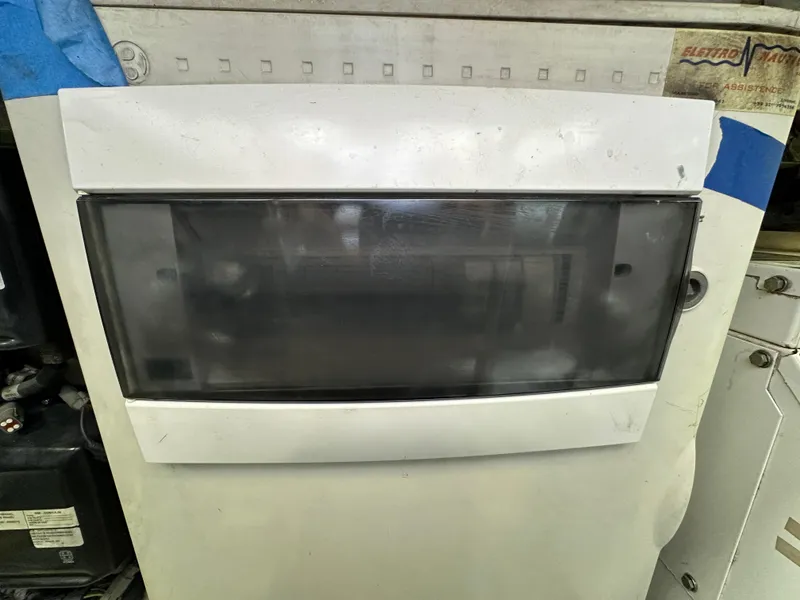 Slide: The Image of Control panel of a 2013 Austin Parker Open 42 boat, featuring a dark display screen. - 42