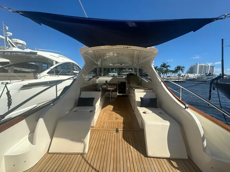 Slide: The Image of Luxurious 2013 Austin Parker Open 42 yacht with spacious deck and elegant seating. - 9