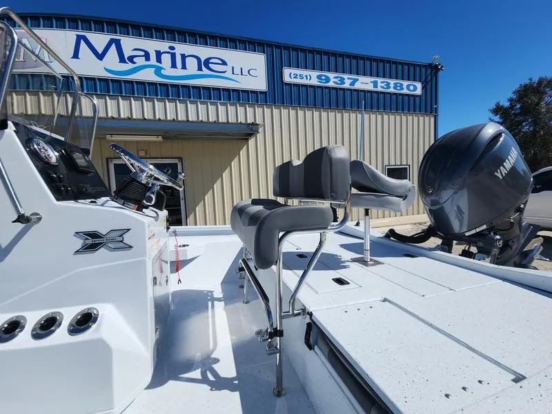Slide: The Image of 2025 Xpress H22 Bay boat with Yamaha engine at Marine LLC dealership. - 7