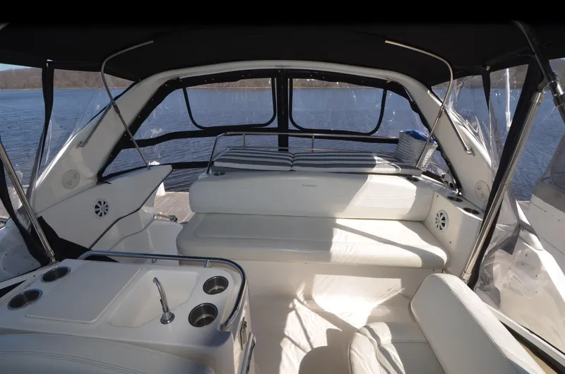 Slide: The Image of Interior view of 2000 Silverton 330 Sport Bridge yacht with seating and sink. - 7
