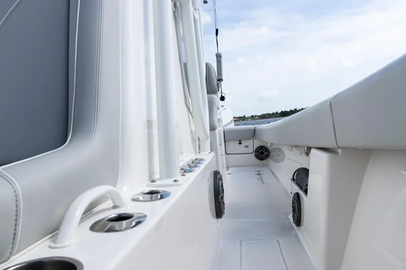 Slide: The Image of 2024 SeaVee 290B boat interior with sleek white design and modern features. - 19