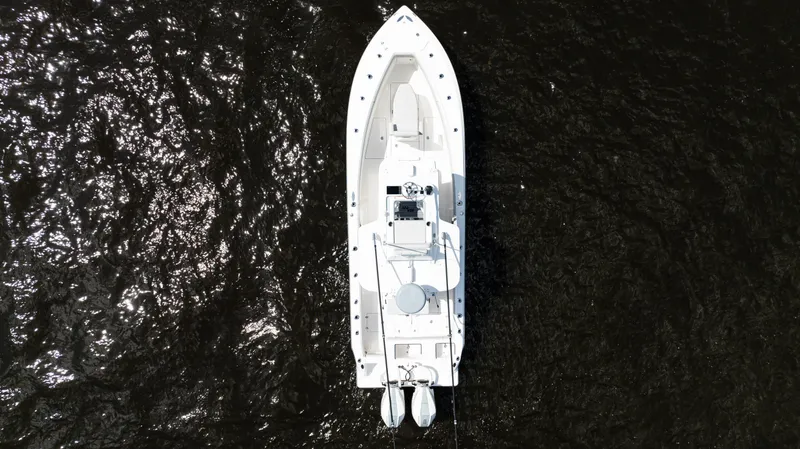 Slide: The Image of Aerial view of 2024 SeaVee 290B boat on dark water. - 48
