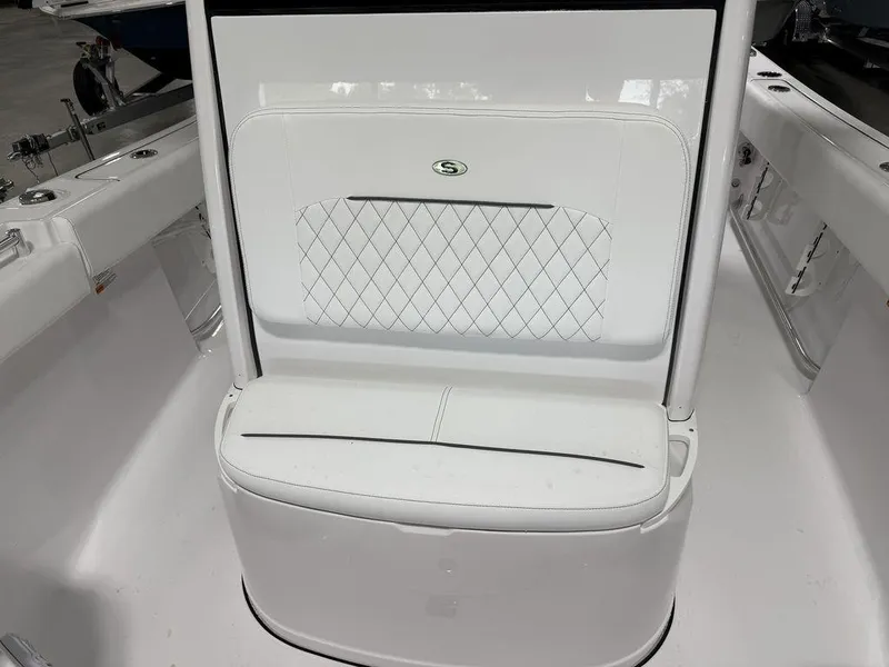 Slide: The Image of 2025 Sportsman Open 212 boat seat with diamond pattern upholstery. - 11