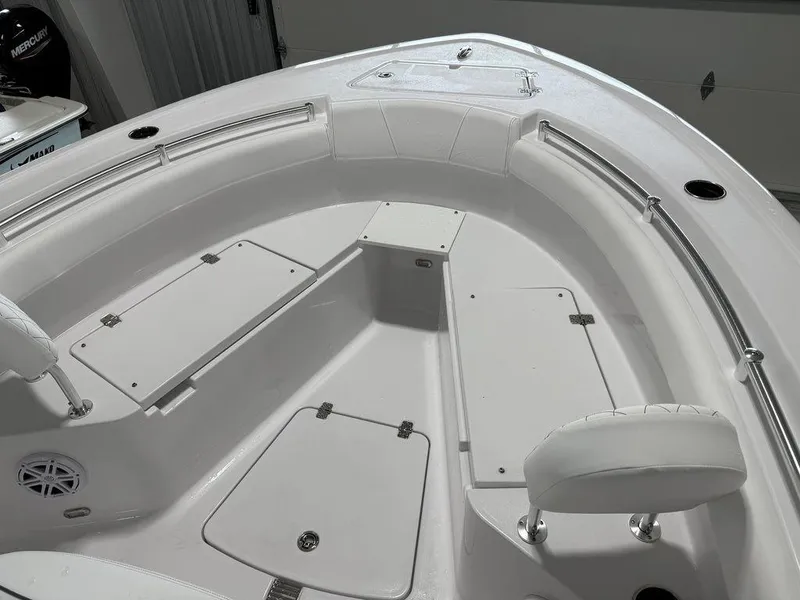 Slide: The Image of 2025 Sportsman Open 212 boat interior with seating and storage compartments. - 3