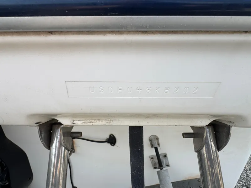 Slide: The Image of 2002 Bayliner 2455 Ciera boat hull identification number (HIN) close-up. - 10