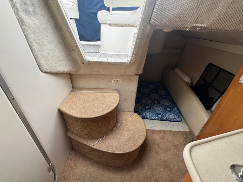 Slide: The Image of Interior cabin of 2002 Bayliner 2455 Ciera with steps and seating area. - 37