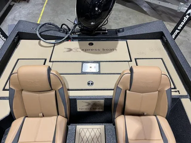 Slide: The Image of 2025 Xpress Hyper-Lift Bass H18 boat interior with Yamaha 115 SHO engine. - 14