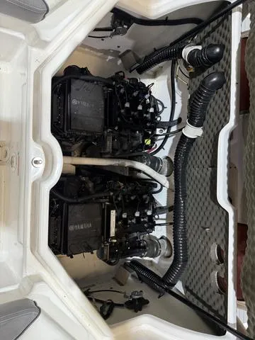 Slide: The Image of 2020 Yamaha AR210 engine compartment with dual engines and hoses. - 21