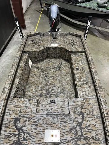 Slide: The Image of 2025 Xpress HD16DB boat with Yamaha 50 engine, camo design, top view. - 8