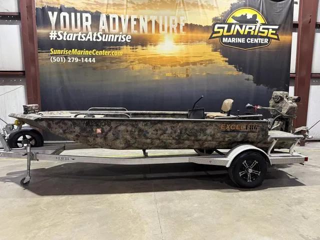 Slide: The Image of 2023 Excel Shallow Water F4 1860 boat with Mud Buddy 40HDR motor on display. - 1