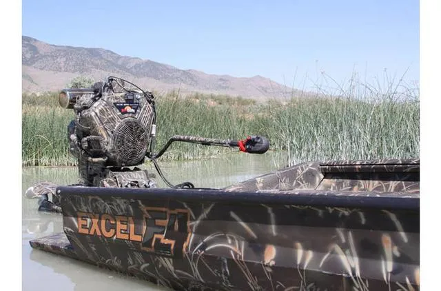 Slide: The Image of 2023 Excel Shallow Water F4 boat with Mud Buddy 40HDR engine in marshland. - 32