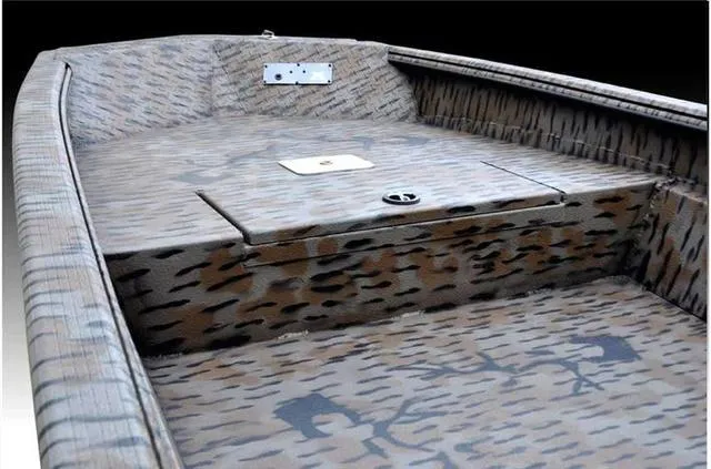 Slide: The Image of 2024 Xpress HD15DBX boat interior with camouflage design and storage compartment. - 10