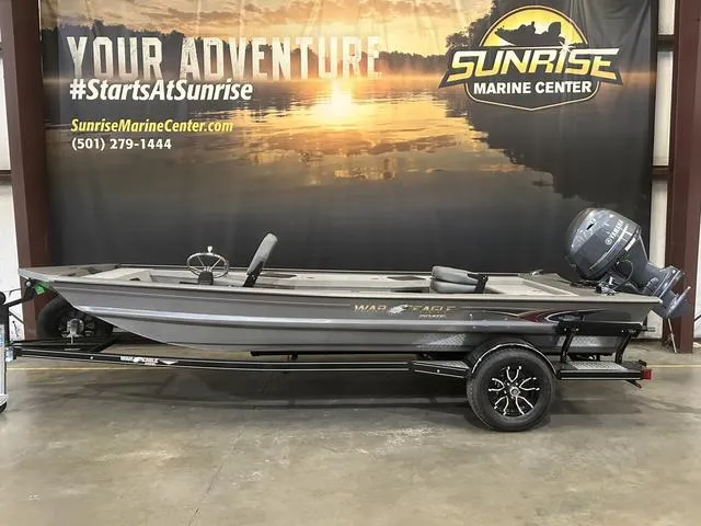 Slide: The Image of 2025 War Eagle 754VS boat with Yamaha 50 engine at Sunrise Marine Center. - 1
