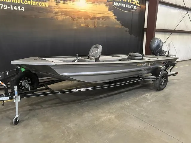 Slide: The Image of 2025 War Eagle 754VS boat with Yamaha 50 engine on trailer in showroom. - 2