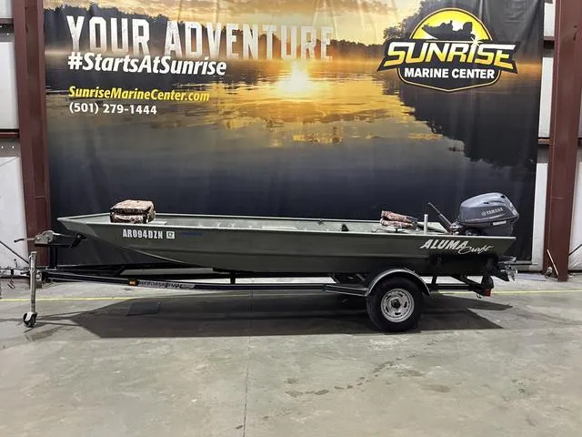 Slide: The Image of 2015 Alumacraft 1648 boat with Yamaha 25 motor on trailer at Sunrise Marine Center. - 2
