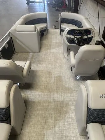 Slide: The Image of 2023 Nepallo Pontoons 22QL with Suzuki 90, featuring spacious seating and modern helm. - 10