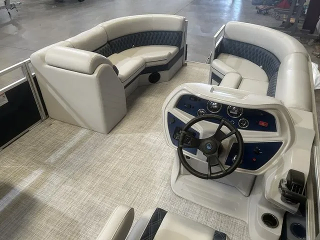 Slide: The Image of 2023 Nepallo Pontoons 22QL with Suzuki 90, featuring spacious seating and modern dashboard. - 13