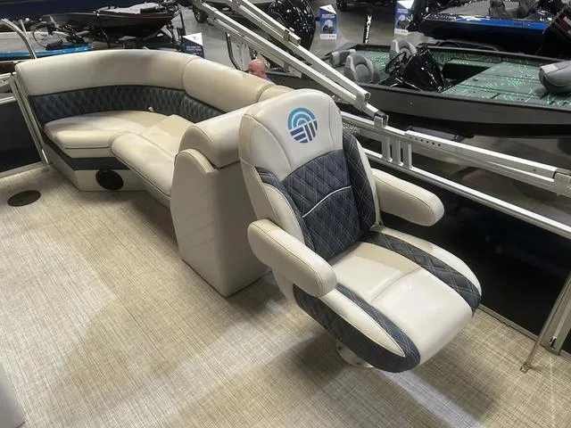 Slide: The Image of 2023 Nepallo Pontoons 22QL interior with plush seating and Suzuki 90 engine. - 14