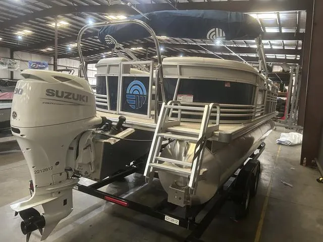 Slide: The Image of 2023 Nepallo Pontoons 22QL with Suzuki 90 engine in a warehouse setting. - 5