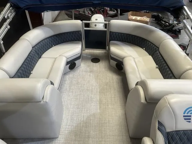 Slide: The Image of 2023 Nepallo Pontoons 22QL interior with Suzuki 90, featuring spacious seating and modern design. - 9