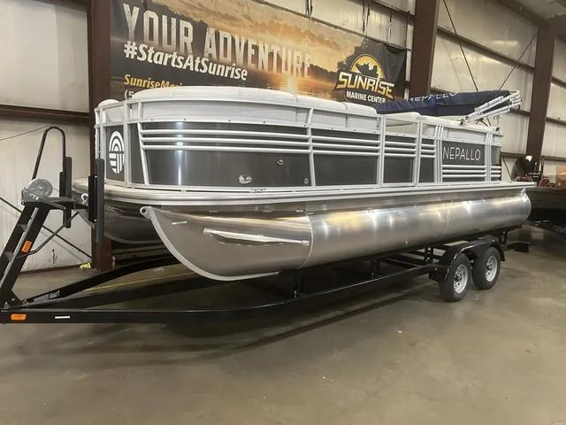 Slide: The Image of 2023 Nepallo Pontoons 20 TL with Suzuki 90, displayed indoors on a trailer. - 1