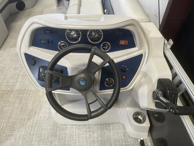 Slide: The Image of 2023 Nepallo Pontoons 20 TL dashboard with steering wheel and controls. - 10