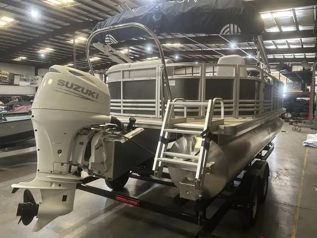 Slide: The Image of 2023 Nepallo Pontoons 20 TL with Suzuki 90 engine in a warehouse setting. - 3