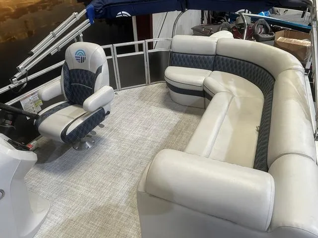 Slide: The Image of 2023 Nepallo Pontoons 20 TL interior with plush seating and steering console. - 7