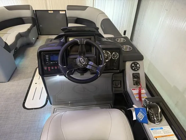 Slide: The Image of 2025 Veranda Relax VR22RCT boat interior with Yamaha 300, featuring modern helm and seating. - 12